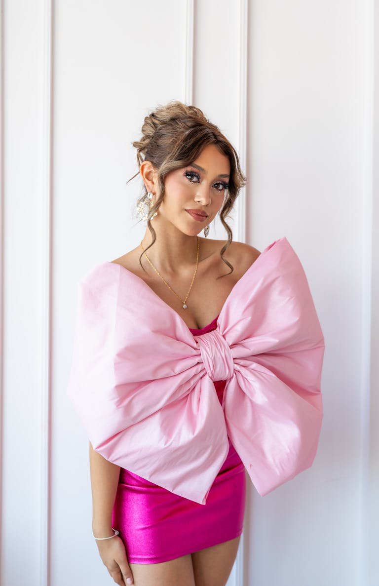 Coquette bow nail inspiration — elegant pink bow aesthetic for 2026 feminine manicure ideas