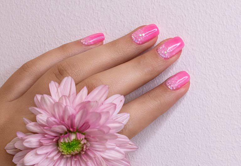Spring nail art ideas - pastel pink DIY manicure with flower for beginners at home